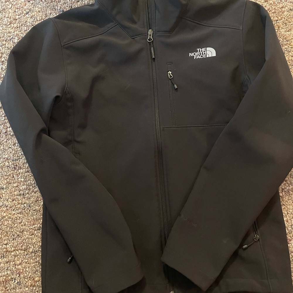 Mens size small north face soft shell jacket.